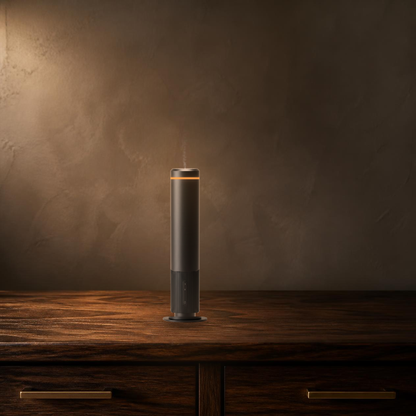 Waterless Diffuser PRO on a walnut credenza in a warm residential interior with amber ambient light ring